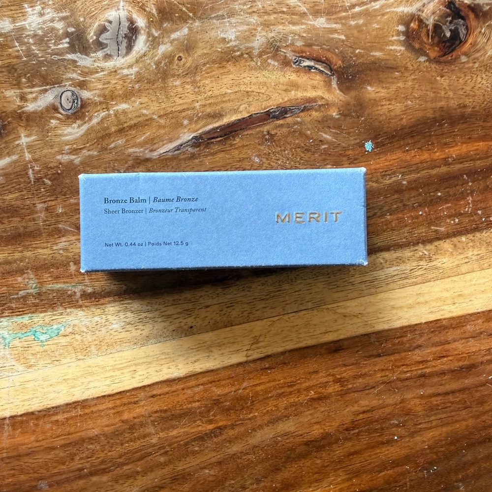 Merit Bronze Balm in Blue Box